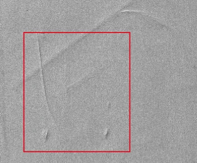 Oblique line-light capture from the same test; the local marked structure is more visible.