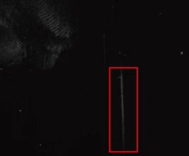 Dark-screen scratch under the source double-angle oblique light; original red box retained.